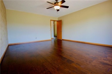 Welcome to your dream home in the heart of the Ozarks! Nestled on Holiday Island Executive Golf Course in Arkansas - for sale on GolfHomes.com, golf home, golf lot