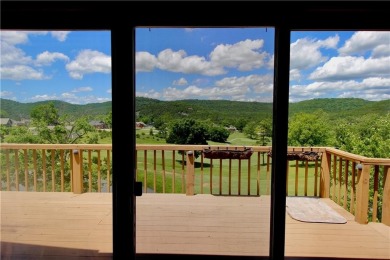 Welcome to your dream home in the heart of the Ozarks! Nestled on Holiday Island Executive Golf Course in Arkansas - for sale on GolfHomes.com, golf home, golf lot