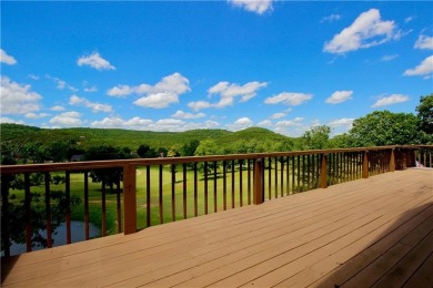 Welcome to your dream home in the heart of the Ozarks! Nestled on Holiday Island Executive Golf Course in Arkansas - for sale on GolfHomes.com, golf home, golf lot