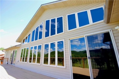 Welcome to your dream home in the heart of the Ozarks! Nestled on Holiday Island Executive Golf Course in Arkansas - for sale on GolfHomes.com, golf home, golf lot