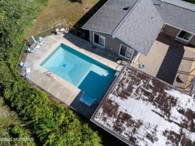 This charming 3-bedroom, 2-bathroom home is perfectly situated on Ocean County Golf Course At Atlantis in New Jersey - for sale on GolfHomes.com, golf home, golf lot