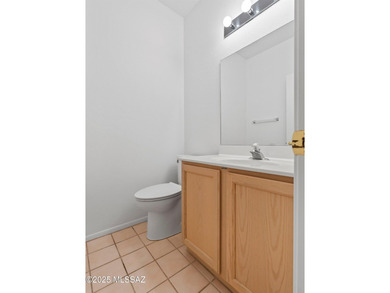 Enjoy this spacious 2-bed, 2.5 bath, 2,630 sqft Vistoso model on The Views Golf Club in Arizona - for sale on GolfHomes.com, golf home, golf lot