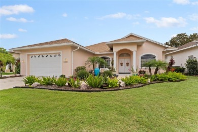 Discover this meticulously maintained 3-bedroom, 2-bathroom home on Huntington Hills Golf and Country Club in Florida - for sale on GolfHomes.com, golf home, golf lot