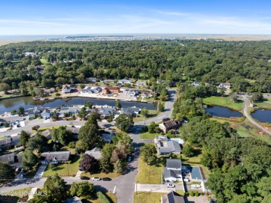 This charming 3-bedroom, 2-bathroom home is perfectly situated on Ocean County Golf Course At Atlantis in New Jersey - for sale on GolfHomes.com, golf home, golf lot