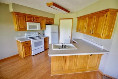 Welcome to your dream home in the heart of the Ozarks! Nestled on Holiday Island Executive Golf Course in Arkansas - for sale on GolfHomes.com, golf home, golf lot