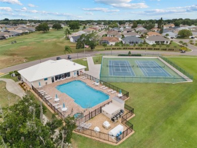 Discover this meticulously maintained 3-bedroom, 2-bathroom home on Huntington Hills Golf and Country Club in Florida - for sale on GolfHomes.com, golf home, golf lot