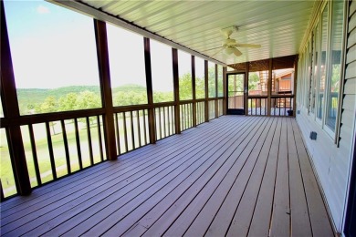 Welcome to your dream home in the heart of the Ozarks! Nestled on Holiday Island Executive Golf Course in Arkansas - for sale on GolfHomes.com, golf home, golf lot