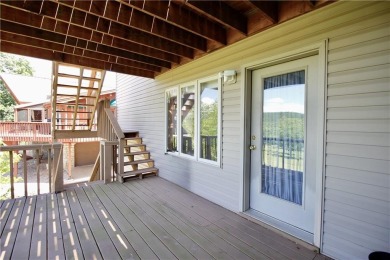 Welcome to your dream home in the heart of the Ozarks! Nestled on Holiday Island Executive Golf Course in Arkansas - for sale on GolfHomes.com, golf home, golf lot