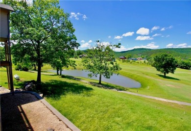 Welcome to your dream home in the heart of the Ozarks! Nestled on Holiday Island Executive Golf Course in Arkansas - for sale on GolfHomes.com, golf home, golf lot