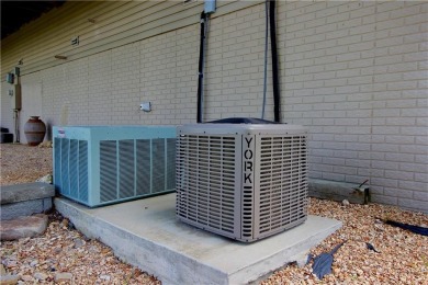 Welcome to your dream home in the heart of the Ozarks! Nestled on Holiday Island Executive Golf Course in Arkansas - for sale on GolfHomes.com, golf home, golf lot