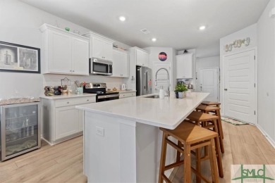 This gorgeous home is located in the luxury gated community of on Savannah Quarters Country Club in Georgia - for sale on GolfHomes.com, golf home, golf lot