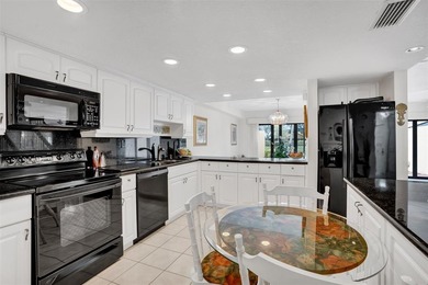 3/2.5 Alhambra Townhome, just under 1900sq ft, waterfront & on Pine Island Ridge Country Club in Florida - for sale on GolfHomes.com, golf home, golf lot