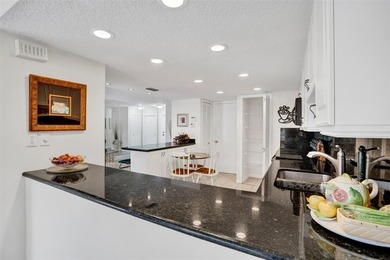 3/2.5 Alhambra Townhome, just under 1900sq ft, waterfront & on Pine Island Ridge Country Club in Florida - for sale on GolfHomes.com, golf home, golf lot