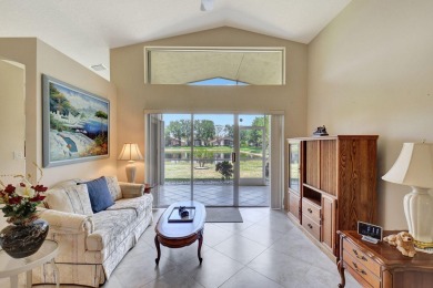Welcome to this spacious 3-bedroom, 2-bathroom LAKEFRONT home on Westchester Golf and Country Club in Florida - for sale on GolfHomes.com, golf home, golf lot