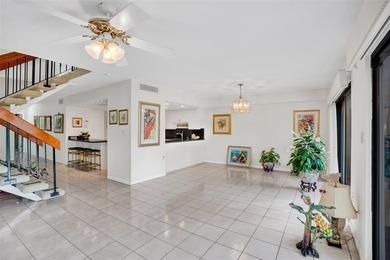 3/2.5 Alhambra Townhome, just under 1900sq ft, waterfront & on Pine Island Ridge Country Club in Florida - for sale on GolfHomes.com, golf home, golf lot