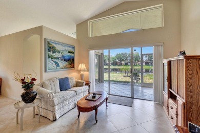 Welcome to this spacious 3-bedroom, 2-bathroom LAKEFRONT home on Westchester Golf and Country Club in Florida - for sale on GolfHomes.com, golf home, golf lot