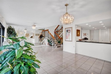 3/2.5 Alhambra Townhome, just under 1900sq ft, waterfront & on Pine Island Ridge Country Club in Florida - for sale on GolfHomes.com, golf home, golf lot