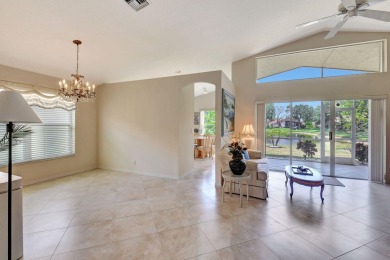 Welcome to this spacious 3-bedroom, 2-bathroom LAKEFRONT home on Westchester Golf and Country Club in Florida - for sale on GolfHomes.com, golf home, golf lot