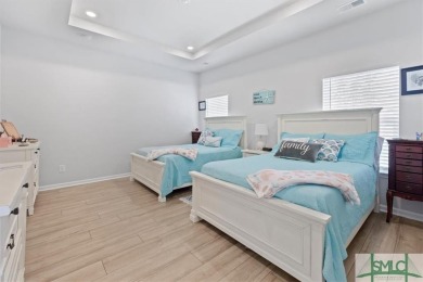This gorgeous home is located in the luxury gated community of on Savannah Quarters Country Club in Georgia - for sale on GolfHomes.com, golf home, golf lot