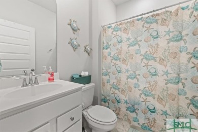 This gorgeous home is located in the luxury gated community of on Savannah Quarters Country Club in Georgia - for sale on GolfHomes.com, golf home, golf lot
