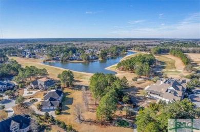 This gorgeous home is located in the luxury gated community of on Savannah Quarters Country Club in Georgia - for sale on GolfHomes.com, golf home, golf lot