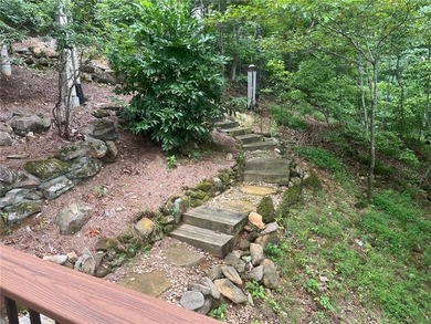 COMFORTABLE OPEN-CONCEPT LIVING. WELL-APPOINTED HOME on Big Canoe Golf Club - Cherokee in Georgia - for sale on GolfHomes.com, golf home, golf lot