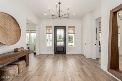 The modern Farmhouse ''St Helena'' model next to the Clubhouse on Sterling Grove Golf & Country Club in Arizona - for sale on GolfHomes.com, golf home, golf lot