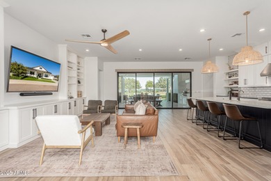 The modern Farmhouse ''St Helena'' model next to the Clubhouse on Sterling Grove Golf & Country Club in Arizona - for sale on GolfHomes.com, golf home, golf lot