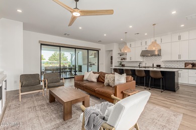 The modern Farmhouse ''St Helena'' model next to the Clubhouse on Sterling Grove Golf & Country Club in Arizona - for sale on GolfHomes.com, golf home, golf lot