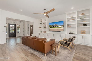 The modern Farmhouse ''St Helena'' model next to the Clubhouse on Sterling Grove Golf & Country Club in Arizona - for sale on GolfHomes.com, golf home, golf lot