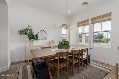 The modern Farmhouse ''St Helena'' model next to the Clubhouse on Sterling Grove Golf & Country Club in Arizona - for sale on GolfHomes.com, golf home, golf lot