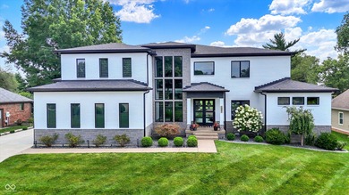 This home is an absolute showstopper-a modern masterpiece tucked on Dyes Walk Golf Course in Indiana - for sale on GolfHomes.com, golf home, golf lot