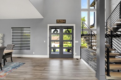 This home is an absolute showstopper-a modern masterpiece tucked on Dyes Walk Golf Course in Indiana - for sale on GolfHomes.com, golf home, golf lot