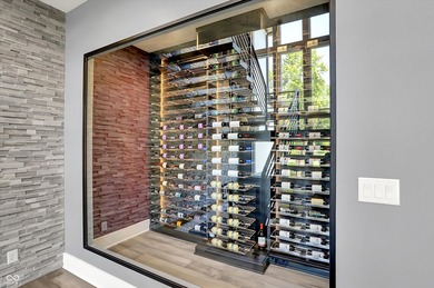 This home is an absolute showstopper-a modern masterpiece tucked on Dyes Walk Golf Course in Indiana - for sale on GolfHomes.com, golf home, golf lot