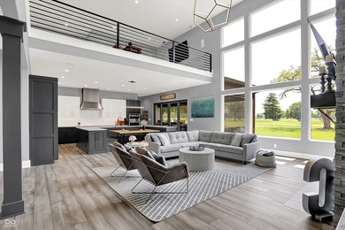 This home is an absolute showstopper-a modern masterpiece tucked on Dyes Walk Golf Course in Indiana - for sale on GolfHomes.com, golf home, golf lot