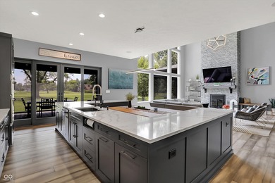 This home is an absolute showstopper-a modern masterpiece tucked on Dyes Walk Golf Course in Indiana - for sale on GolfHomes.com, golf home, golf lot