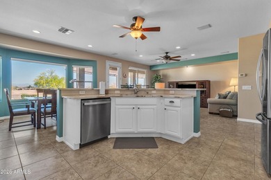 If you are looking for stunning mountain and golf course views on The Golf Club At Johnson Ranch in Arizona - for sale on GolfHomes.com, golf home, golf lot