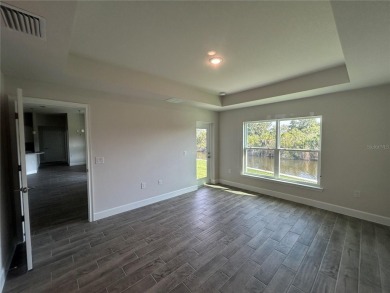 Under Construction. The Adams 2265 model offers plenty of space on Deep Creek Golf Club in Florida - for sale on GolfHomes.com, golf home, golf lot