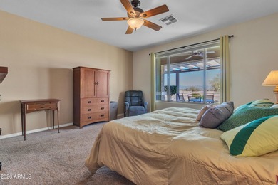 If you are looking for stunning mountain and golf course views on The Golf Club At Johnson Ranch in Arizona - for sale on GolfHomes.com, golf home, golf lot