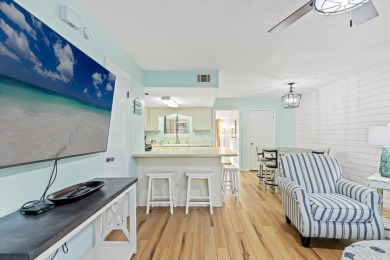 Rare 3-Bedroom End Unit Townhome with Downstairs Bedroom & Bath on Edgewater Beach Resort in Florida - for sale on GolfHomes.com, golf home, golf lot