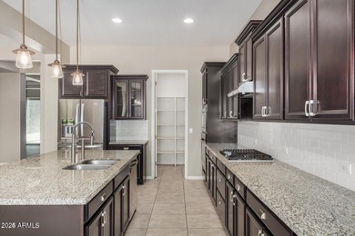 Discover the Arizona lifestyle you've been dreaming of in on Estrella Mountain Ranch Golf Course in Arizona - for sale on GolfHomes.com, golf home, golf lot