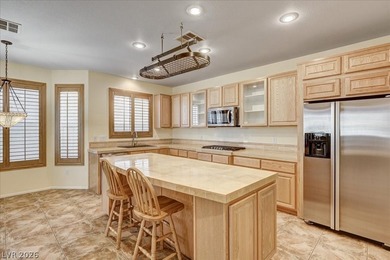 Well-loved one-story home in the guard-gated golf community of on Rhodes Ranch Golf Club in Nevada - for sale on GolfHomes.com, golf home, golf lot