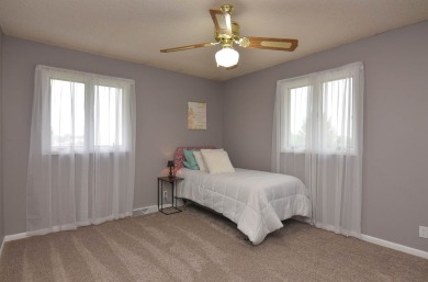 New Price! Spacious multi level home with a fantastic location on Knoll Ridge Country Club in Iowa - for sale on GolfHomes.com, golf home, golf lot