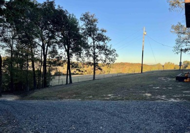 Experience the welcoming beauty of this two story Unrique Modern on Glenwood Country Club in Arkansas - for sale on GolfHomes.com, golf home, golf lot