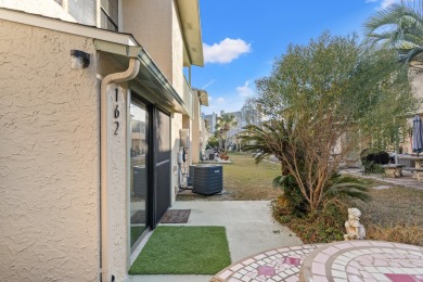 Rare 3-Bedroom End Unit Townhome with Downstairs Bedroom & Bath on Edgewater Beach Resort in Florida - for sale on GolfHomes.com, golf home, golf lot