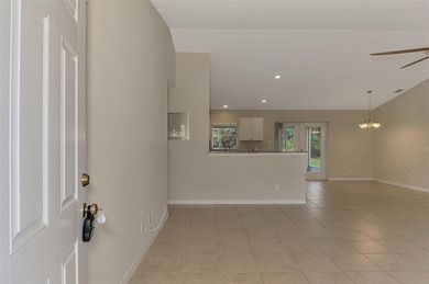 Welcome to this well-maintained 3-bedroom, 2-bath home with a on Duffys Golf Center in Florida - for sale on GolfHomes.com, golf home, golf lot