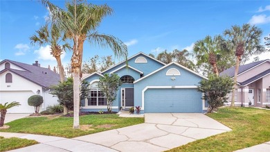 Immaculate home in highly desirable Waterford Lakes, nestled on on Eastwood Golf Club in Florida - for sale on GolfHomes.com, golf home, golf lot