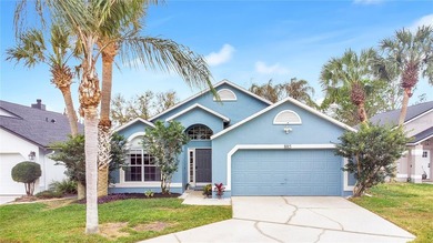 Immaculate home in highly desirable Waterford Lakes, nestled on on Eastwood Golf Club in Florida - for sale on GolfHomes.com, golf home, golf lot