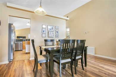 Immaculate home in highly desirable Waterford Lakes, nestled on on Eastwood Golf Club in Florida - for sale on GolfHomes.com, golf home, golf lot