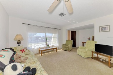 Welcome to this well-located 2 bedroom, 2 bath, 2 car garage on Venice East Golf Club in Florida - for sale on GolfHomes.com, golf home, golf lot